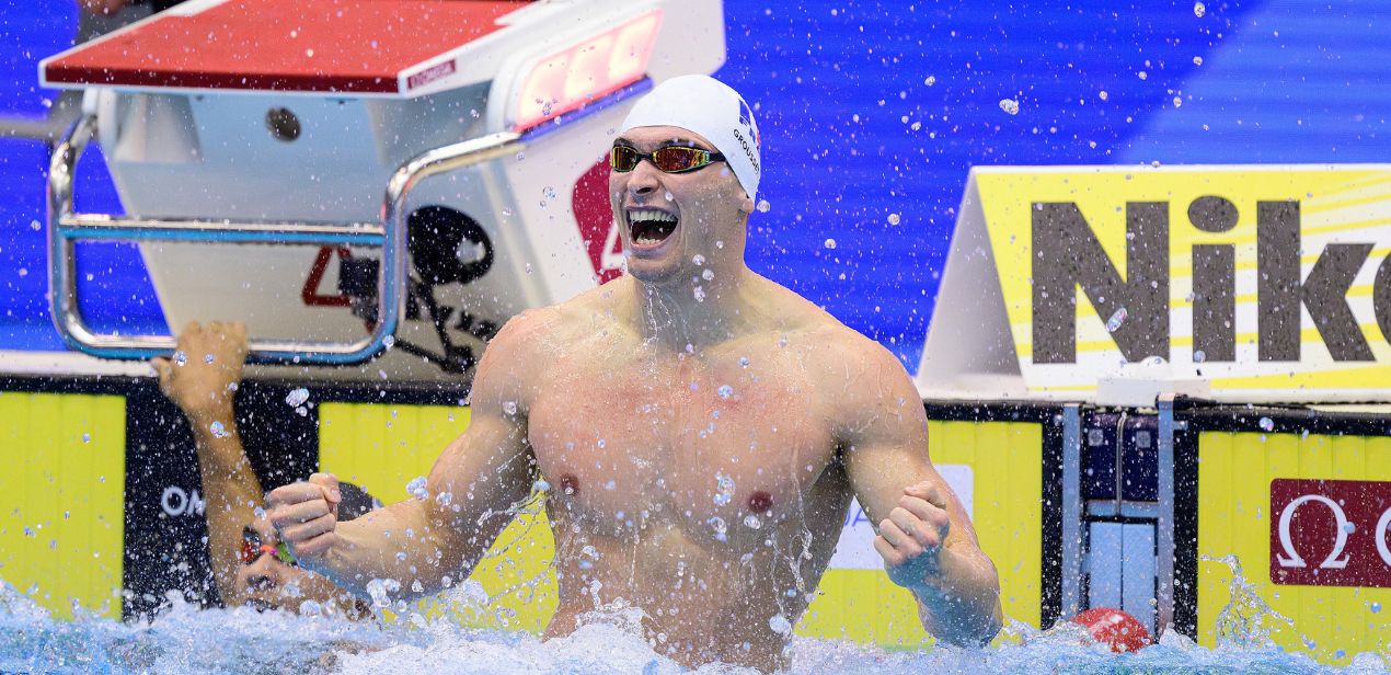 Maxime Grousset celebrating in pool